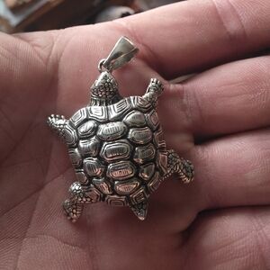 Intricate Silver Turtle Pendant